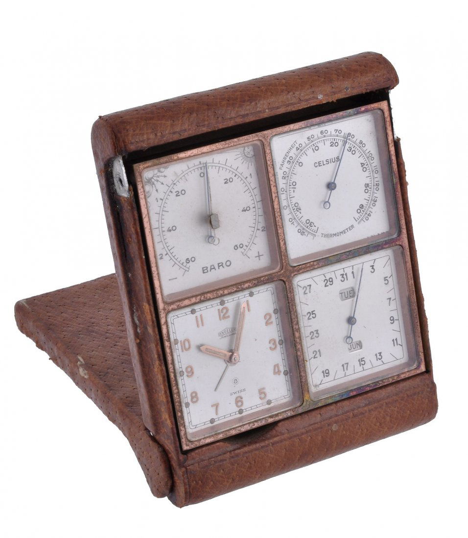 Angelus, Foursome, a leather and gilt brass desk c: Angelus, Foursome, a leather and gilt brass desk compendium, 1950s, with an 8-day clock and alarm, date- month- day- calendar, thermometer and barometer, the leather covered case with folding cover fo