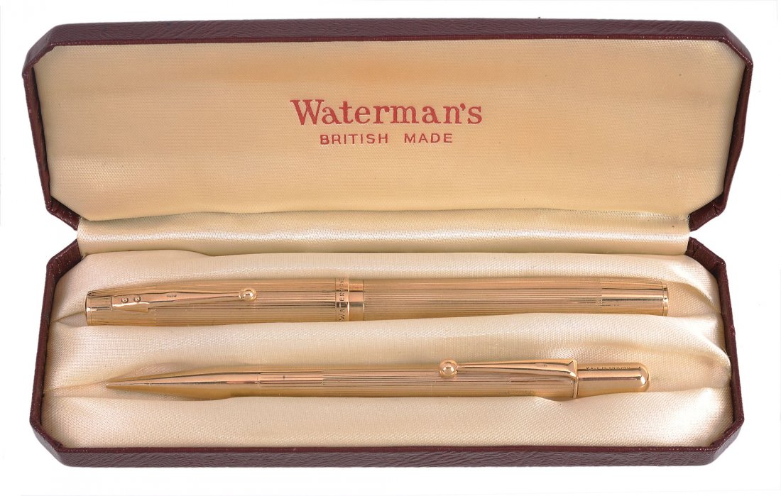 Waterman, a 9 carat gold fountain pen and pencil s: Waterman, a 9 carat gold fountain pen and pencil set, the fountain pen with striated decoration to the cap and barrel, the 2A flexible nib stamped CT', with a lever filling system, full London hallmar
