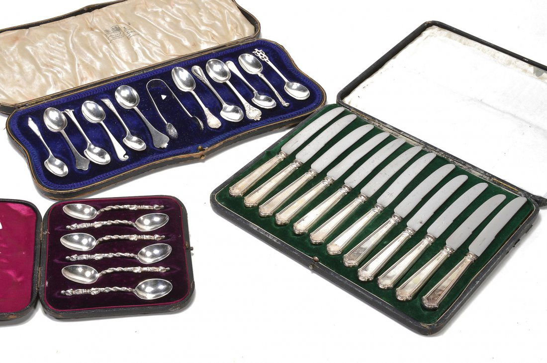 A cased set of six Victorian silver Apostle tea spoons: A cased set of six Victorian silver Apostle tea spoons by Sibray, Hall & Co., London 1887, 10cm long; a cased set of twelve tea knives by Walker & Hall, Sheffield 1917, with stainless steel blades, 19