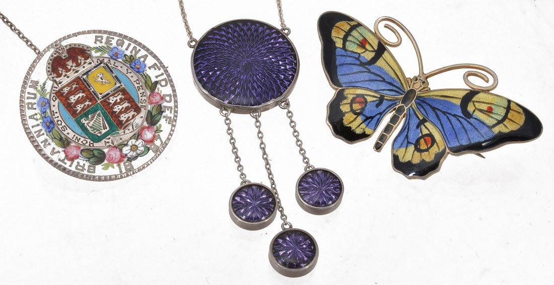 An enamelled butterfly brooch by Marius Hammer, Norway: An enamelled butterfly brooch by Marius Hammer, Norway, the polychrome enamel butterfly stamped on the reverse with â€œ0S' and makers mark, wingspan 6cm; together with a purple guilloche enamel pe