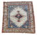 A Karachalo rug , the central ivory field with