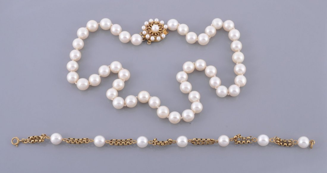 A cultured pearl necklace, the forty six 8: A cultured pearl necklace, the forty six 8.8mm cultured pearls, on a knotted string, to a concealed box snap clasp set with cultured pearls, stamped 9ct , 47.5cm long; together with a cultured pearl b