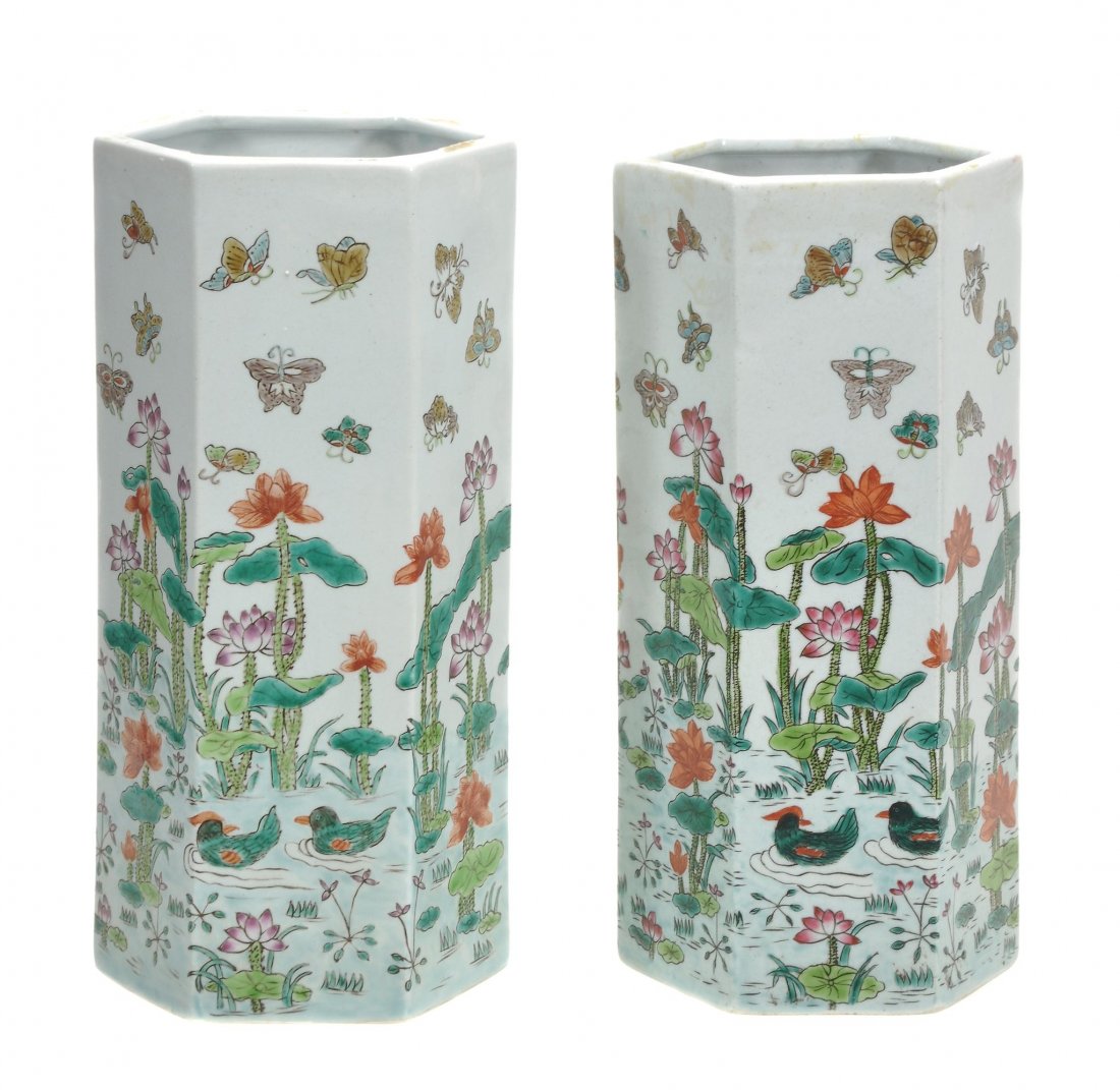 A pair of Chinese hexagonal vases decorated with: A pair of Chinese hexagonal vases decorated with butterflies hovering above geese swimming in a lotus pond, Tongzhi six-character archaistic mark 28.6cm high