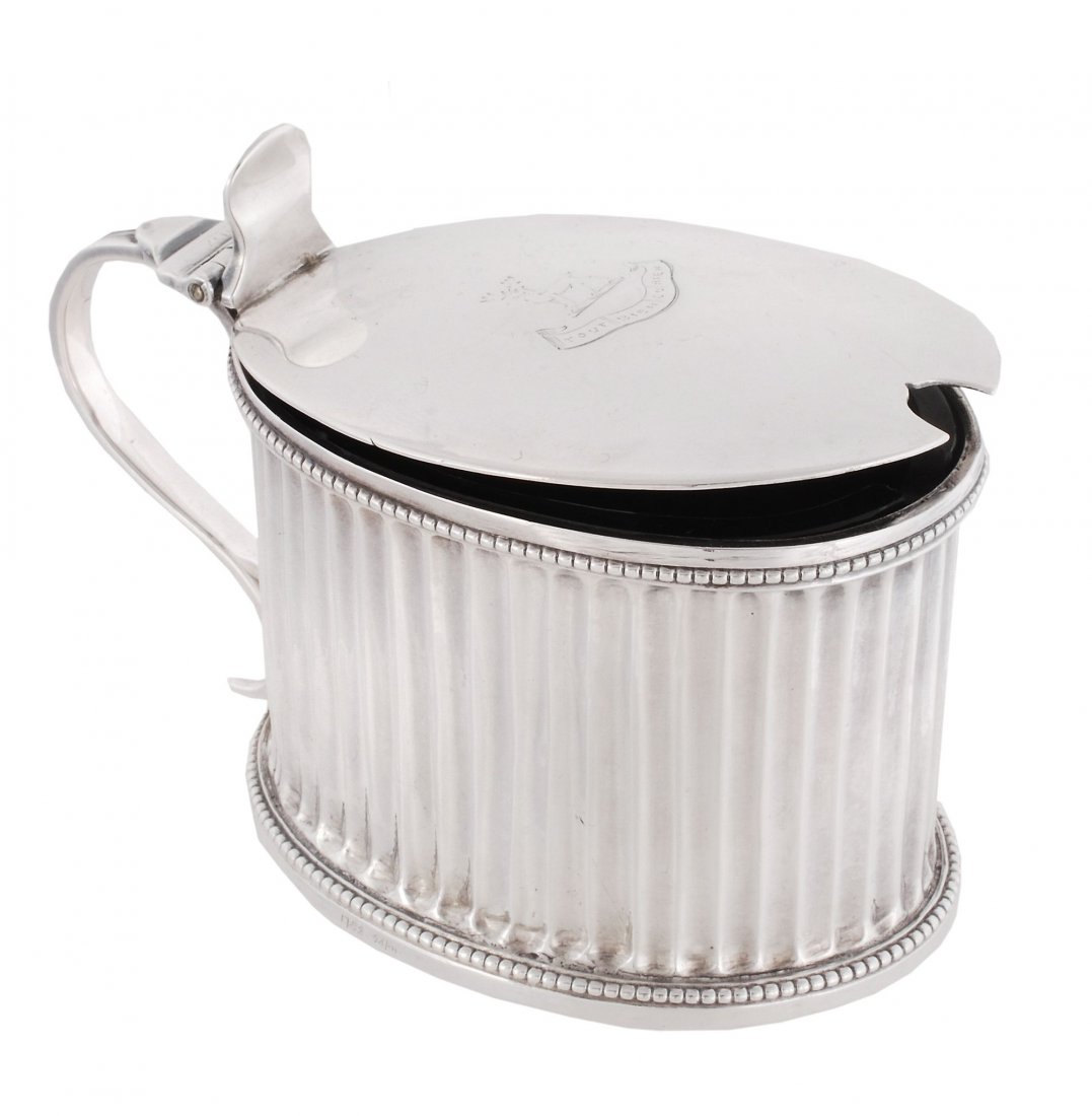 A George III silver fluted mustard pot, no maker's: A George III silver fluted mustard pot, no maker's mark, London 1788, with a slightly domed cover, the threaded S-scroll handle with a rounded thumb piece, beaded rims and fluted sides, with a blue gl