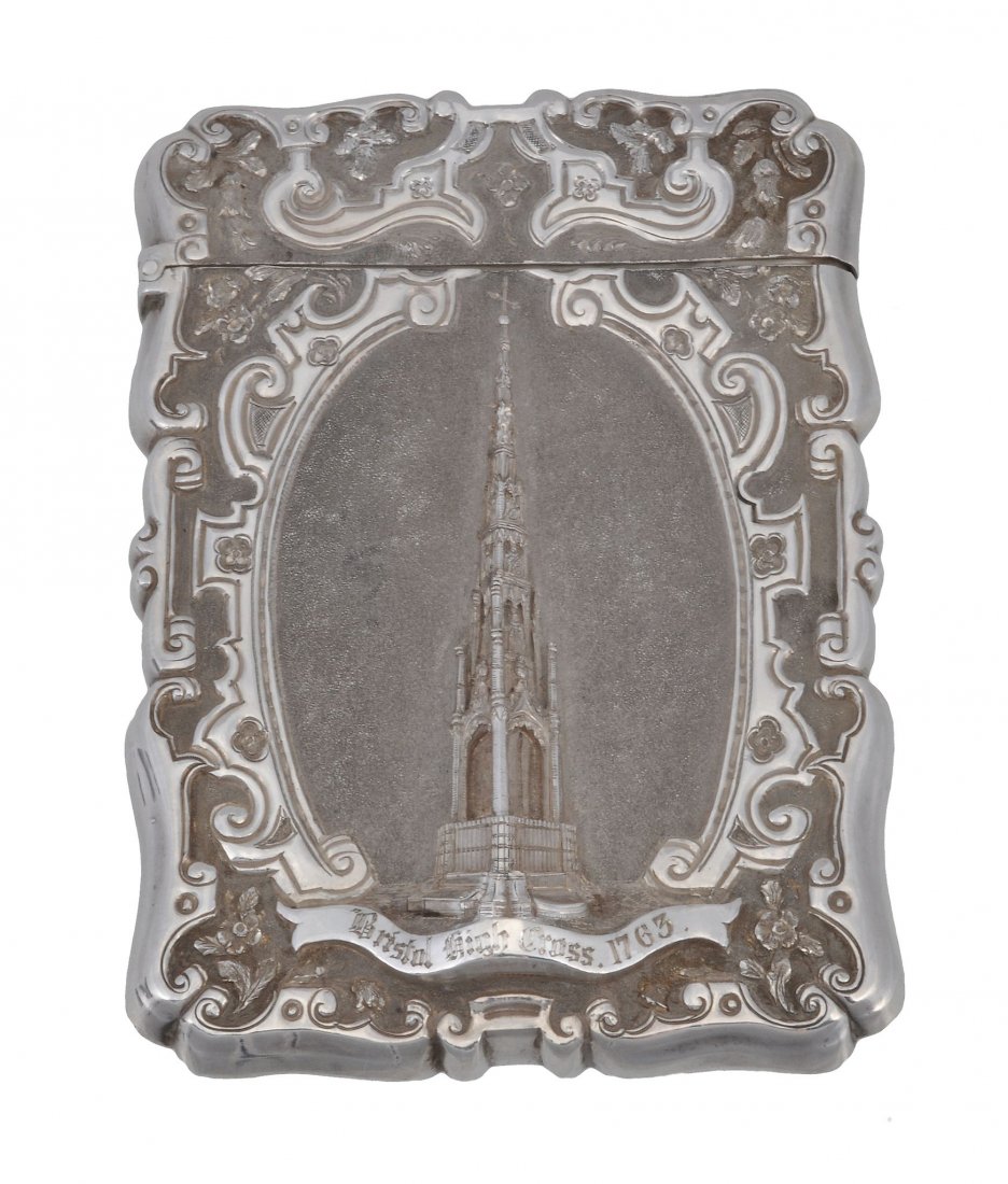 A rare Victorian silver castle top card case by: A rare Victorian silver castle top card case by Nathaniel Mills, Birmingham 1848, titled Bristol High Cross 1763 , on a matted ground in a parchment-type oval reserve with scroll and flower chasing, t