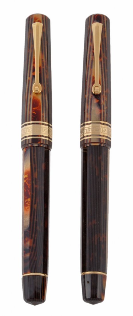 Omas, Paragon Bronze Arco fountain pen and roller ball: Omas, Paragon Bronze Arco fountain pen and roller ball pen , the celluloid twelve sided barrel with bronze barrel and cap, gilt trim and clip, the fountain pen with a two colour nib signed Omas and st