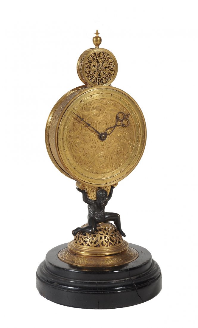 A very rare German Renaissance gilt brass astronomical: A very rare German Renaissance gilt brass astronomical monstrance table clock case originally fitted with a Universal Astrolabe In the manner of Jeremiah Metzger, Augsburg, circa 1570, the movement an