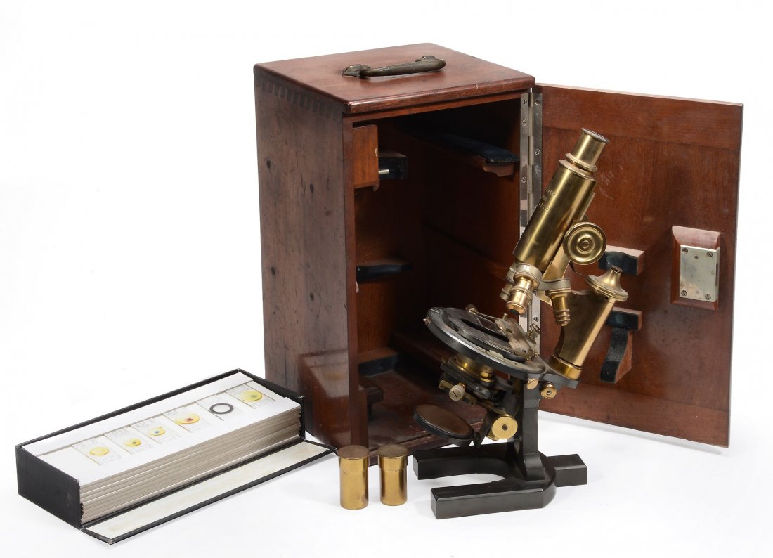 A lacquered and patinated brass monocular microscope: A lacquered and patinated brass monocular microscope Carl Zeiss, Jena, circa 1900 The tube with rack and pinion coarse and fine top-screw focus adjustment and signed Carl Zeiss, Jena, No. 26173 to fro