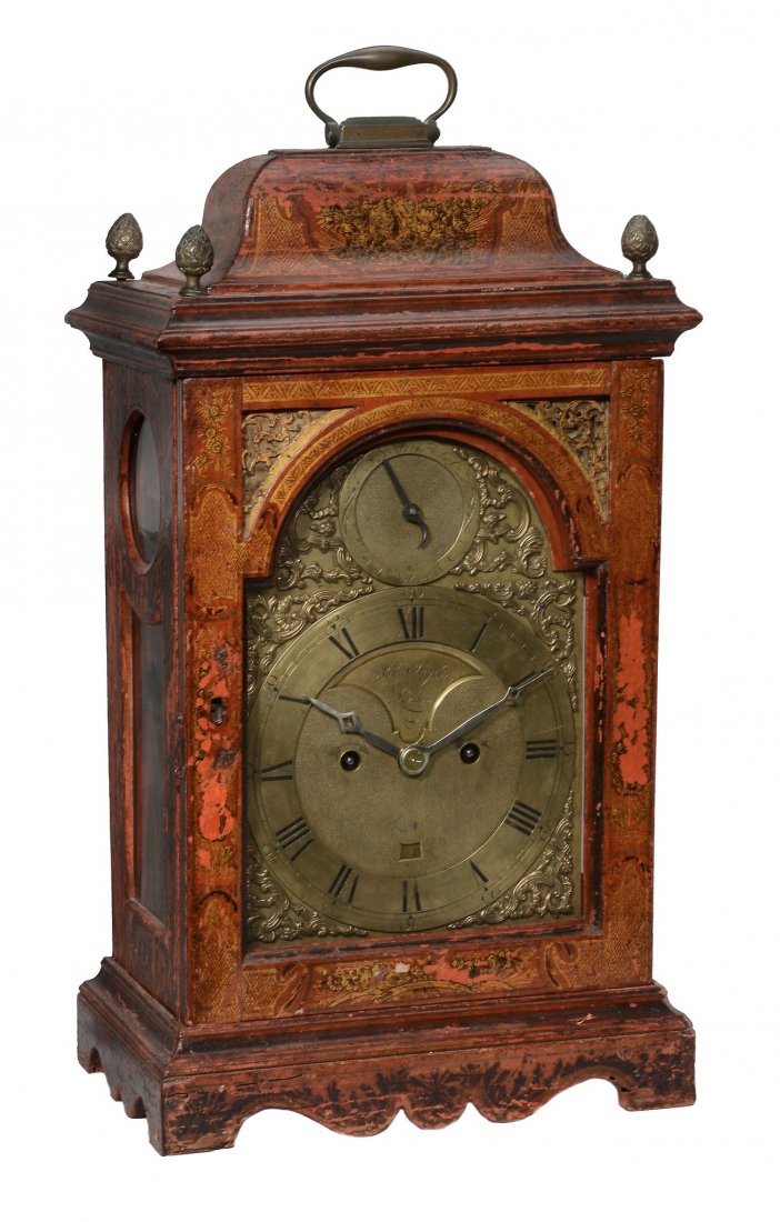 A rare George III scarlet japanned table clock John: A rare George III scarlet japanned table clock John Taylor, London, circa 1775 The five pillar twin fusee bell striking movement with verge escapement regulated by short bob pendulum with holdfast to