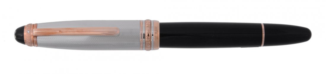 Montblanc, Meisterstuck 1924, 75th Anniversary limited: Montblanc, Meisterstuck 1924, 75th Anniversary limited edition fountain pen, no. 0085/1924, issued in 1999, the black resin barrel with a silver engine turned cap, the nib stamped 18K, with a piston f