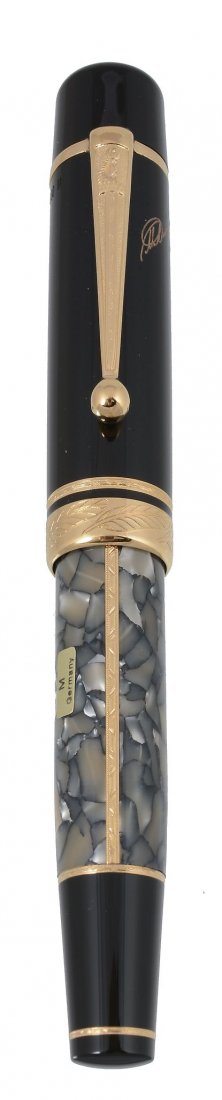 Montblanc, Writers Edition, Alexandre Dumas, a limited: Montblanc, Writers Edition, Alexandre Dumas, a limited edition fountain pen, no.09682/20000, issued in 1996, the black and marbled resin body with gold plated mounts, the medium nib stamped 750, with 