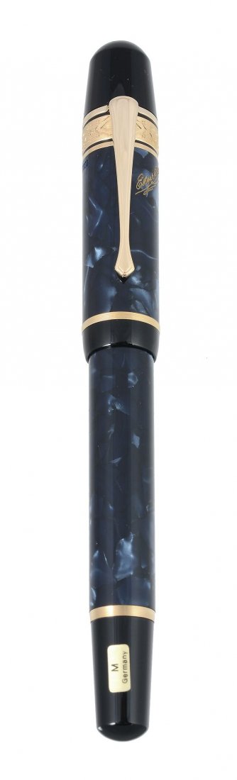 Montblanc, Writers Edition, Edgar Allen Poe, a limited: Montblanc, Writers Edition, Edgar Allen Poe, a limited edition fountain pen, no.03228/17000, issued in 1998, the dark blue marbled body with gold plated incised band to cap, incised signature to barre