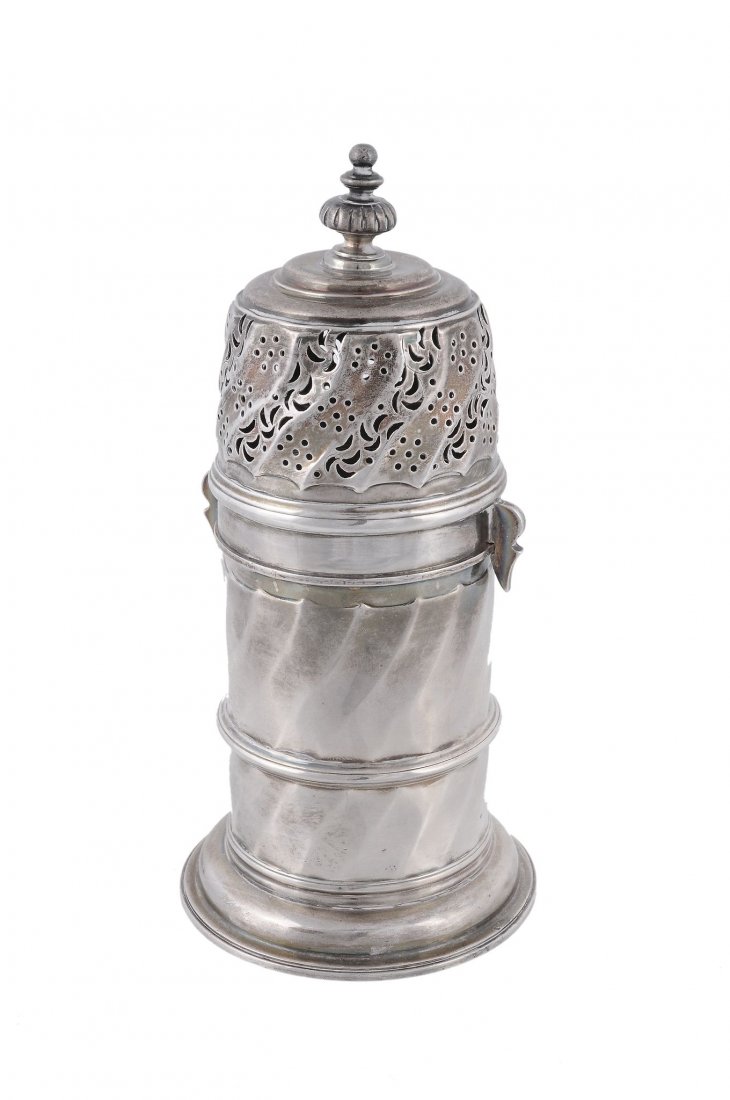 A Victorian silver Britannia standard lighthouse caster: A Victorian silver Britannia standard lighthouse caster by Charles Stuart Harris, London 1889, with a ball and lobed finial to the wrythen and pierced cover, the wrythen body with a girdle and on a mo