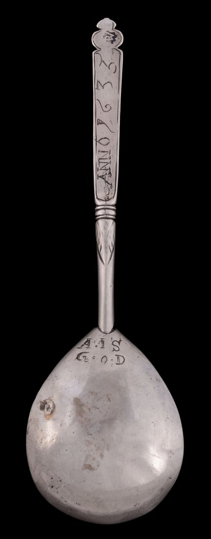 A 17th century Norwegian silver Volutt type spoon,: A 17th century Norwegian silver Volutt type spoon, unidentified maker's mark only (DW or RW in monogram), circa 1635, the back of the fig shaped bowl engraved A. IS over G. OD , the engraved stem flat