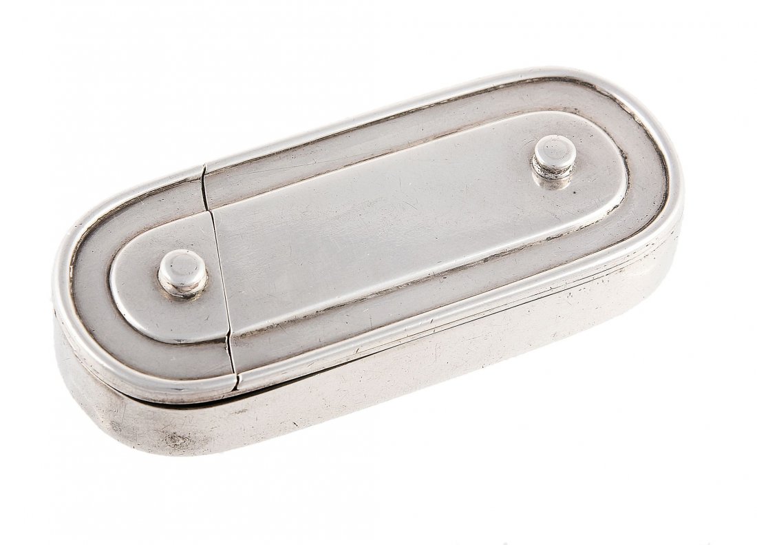 A Victorian silver oblong puzzle opening novelty vesta: A Victorian silver oblong puzzle opening novelty vesta case by Thomas Johnson I, London 1875, in the form of a wooden pencil box, the sliding cover with a swing part covering the striker, 7.5cm (3in)