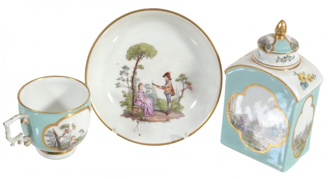 A Meissen turquoise-ground tea cannister and cover ,: A Meissen turquoise-ground tea cannister and cover , circa 1745, painted with gilt-line quatrefoil panels of figures within central european landscapes, faint trace of blue crossed swords mark, 13cm h