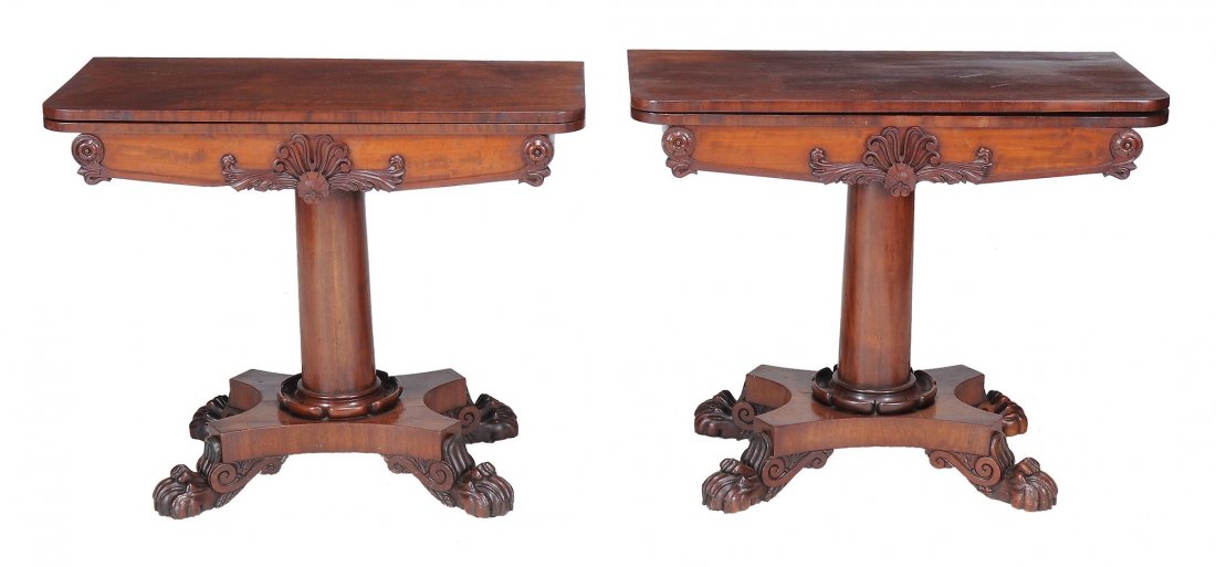 A pair of William IV mahogany folding tea tables, circa: A pair of William IV mahogany folding tea tables, circa 1835, each rectangular top above a shaped frieze centred by an anthemion motif and flanked by roundels, each barrell turned stem above a concave