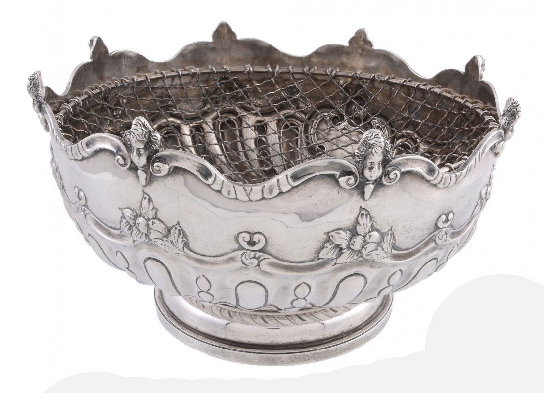 A late Victorian silver pedestal rose bowl by Charles: A late Victorian silver pedestal rose bowl by Charles Stuart Harris, London 1897, with a cherub head and scroll shaped rim and a scroll and massed fruit band with gadrooning beneath, on a moulded circ