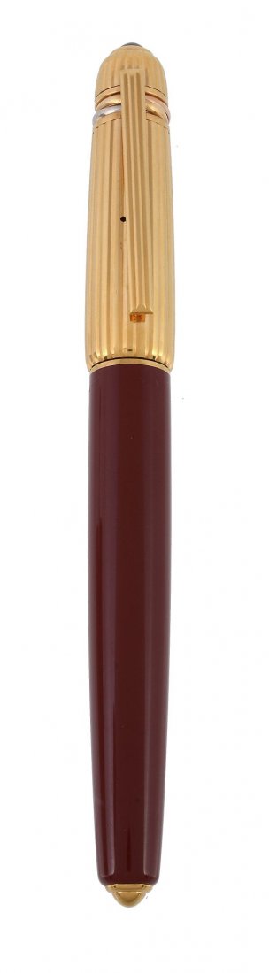 Cartier, Pasha de Cartier, a red lacquer and gold (1 of 3)