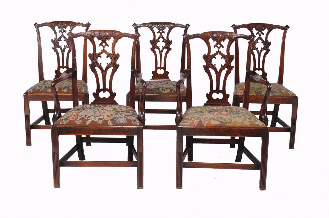 -108 A set of ten George III mahogany dining chairs,: -108 A set of ten George III mahogany dining chairs, circa 1780, after a design by Thomas Chippendale, including a pair of armchairs with pierced foliate splats, on chamfered reeded legs joined by str