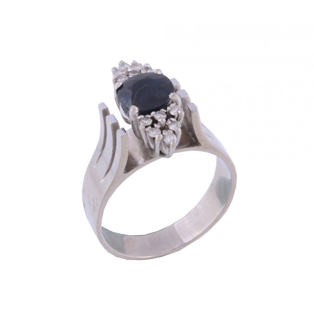 A sapphire and diamond dress ring, the circular shaped (1 of 2)