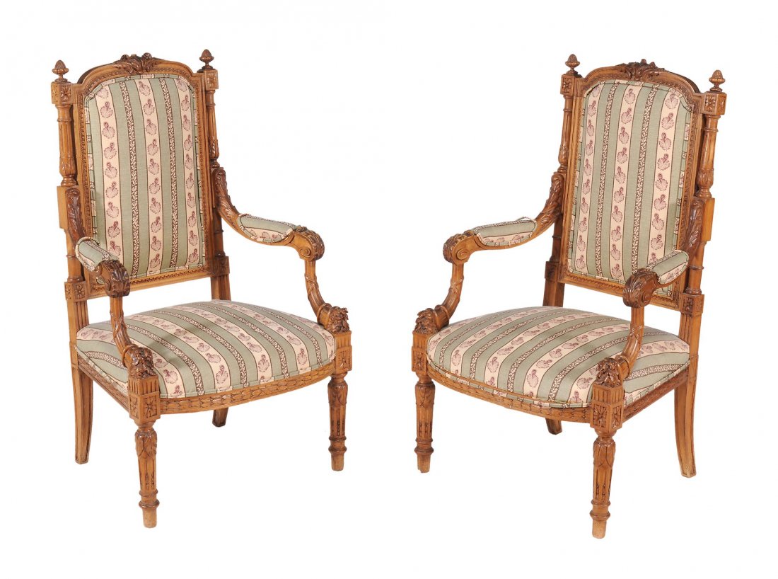 A pair of carved beech framed armchairs in 18th century (1 of 2)