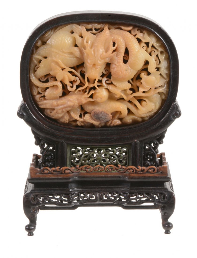 A Chinese jade oval Ming-style confronting dragon table (1 of 3)