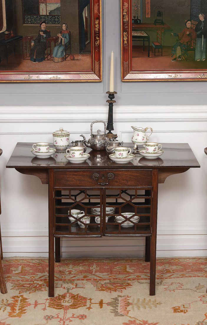 A George III mahogany 'Breakfaste' Pembroke table ,: A George III mahogany 'Breakfaste' Pembroke table , circa 1770, after a design Thomas Chippendale, the rectangular twin flap top with frieze drawer above an enclosed undertier with pierced fretwork si