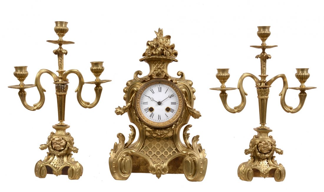 A French Louis XV style gilt brass mantel clock (1 of 2)