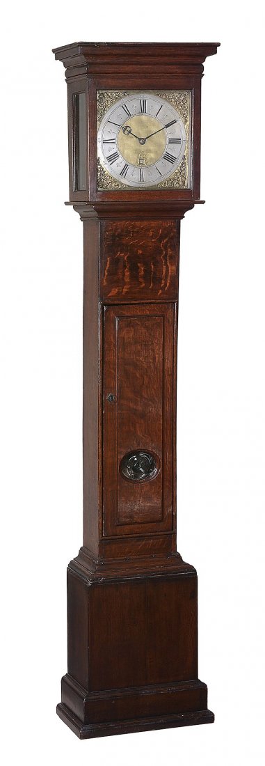 An unusual Queen Anne oak longcase James Smith,: An unusual Queen Anne oak longcase James Smith, Aspendenhall, circa 1710 The substantial two-handed movement with plates measuring 9.25 by 7.75 inches united by four generous finned pillars pinned at
