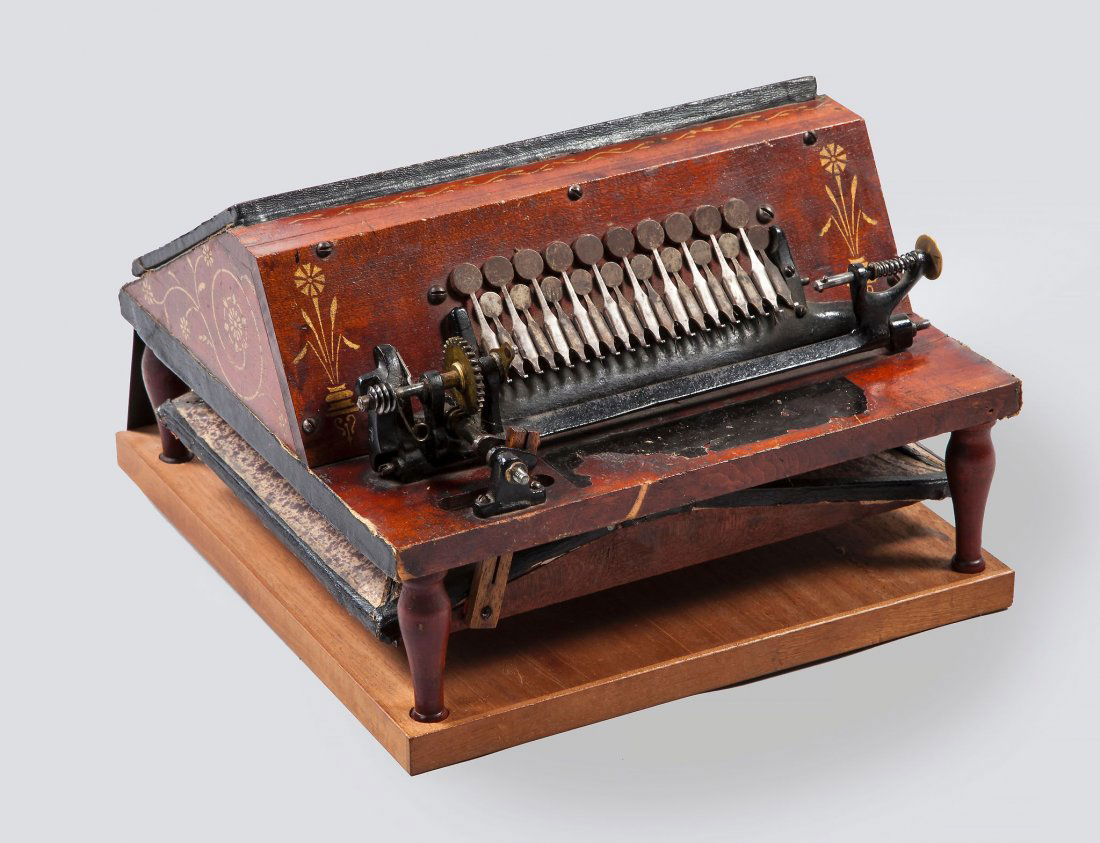 ‘The Gem Roller Organ’, a free-reed barrel: The Gem Roller Organ , a free-reed barrel organ by The Autophone Company, Ithaca, New York, circa 1885 , with twenty keys operated by pinned barrels, hand-cranked bellows, with later glazed case conta