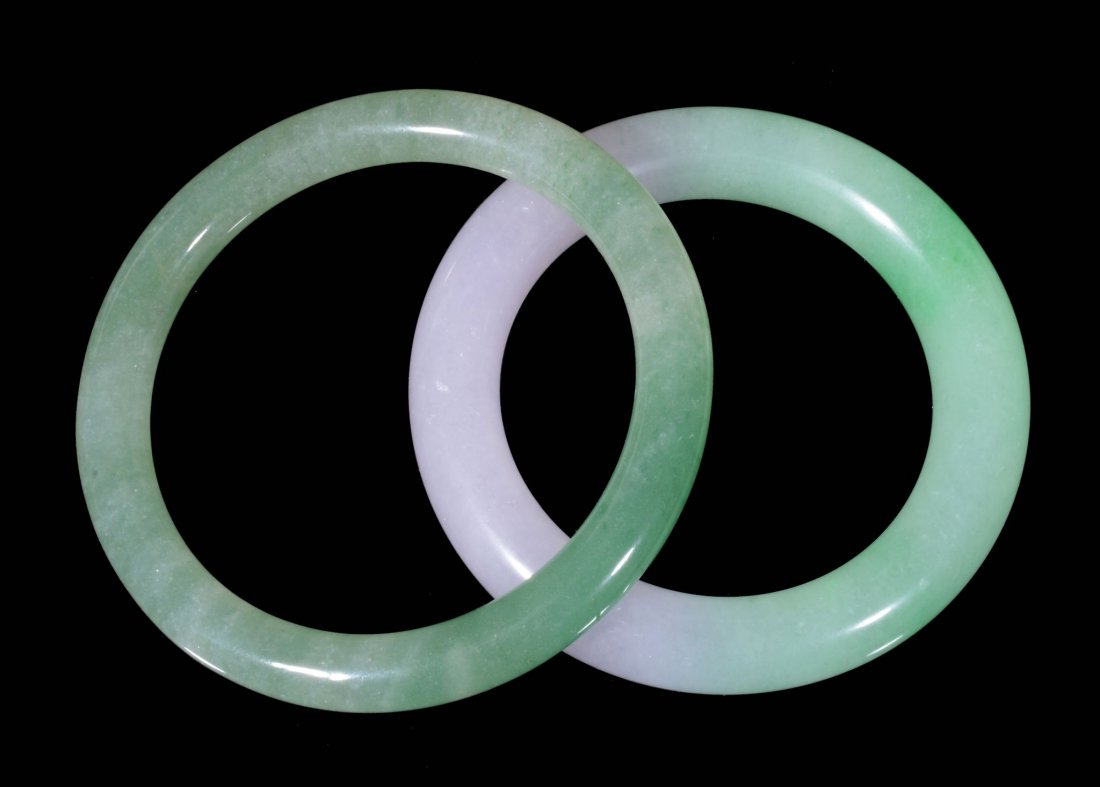 Two Chinese jadeite bangles, 8cm and 8.2cm diam (1 of 3)