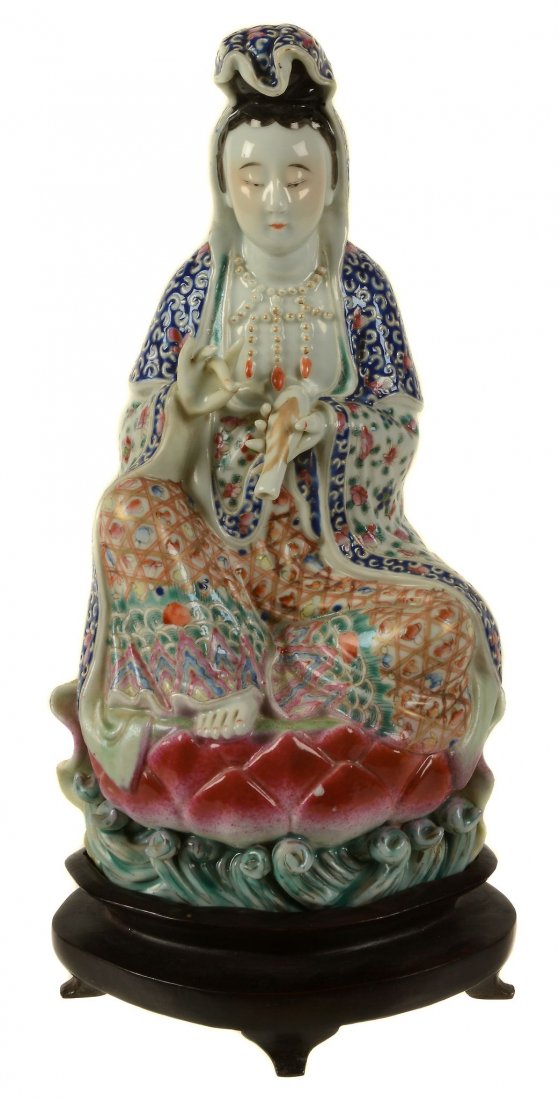 A Chinese Famille Rose seated figure of Guanyin (1 of 2)