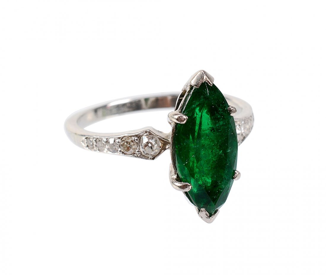 An emerald and diamond dress ring, the marquise cut (1 of 2)
