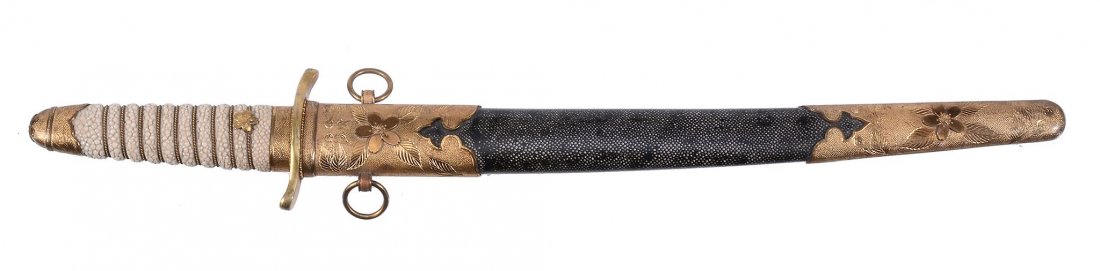 A Japanese Tanto Blade , 27.2cms long, of hira tsukuri: A Japanese Tanto Blade , 27.2cms long, of hira tsukuri, slight torii zori form with a single hi to either side, hamon is gunome midare of nie, details of nakago unavailable; mounted in 20th Century Na