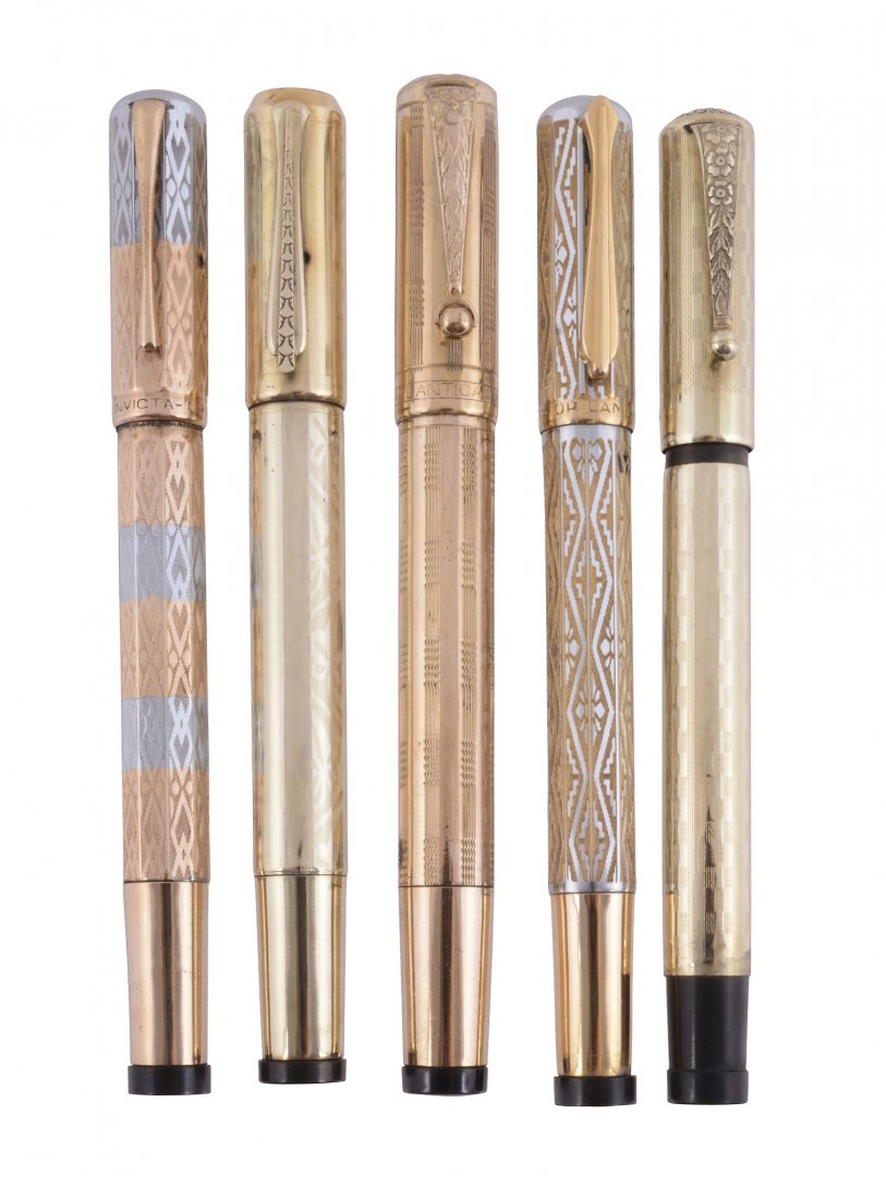 Invicta, a Continental overlay safety pen: Invicta, a Continental overlay safety pen, the two colour cap and barrel with engine turned engraving, inked; a further Invicta Continental overlay safety pen, inked; together with three Continental o