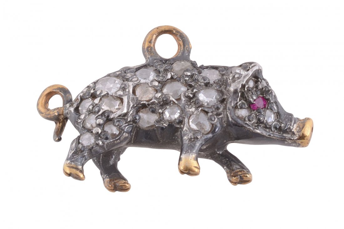 A diamond set pig charm, the pig set throughout with (1 of 2)