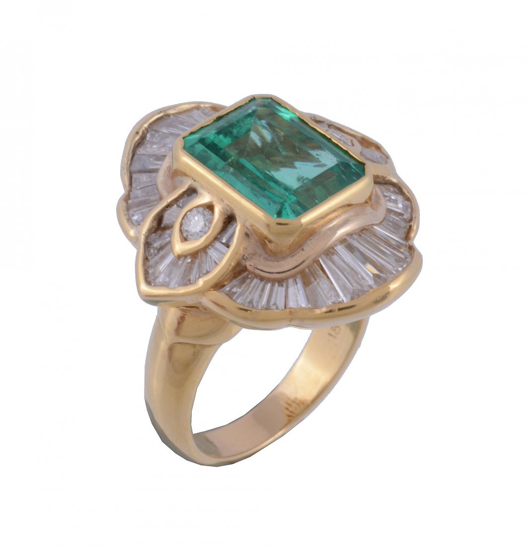 An emerald and diamond ring, the rectangular cut (1 of 4)