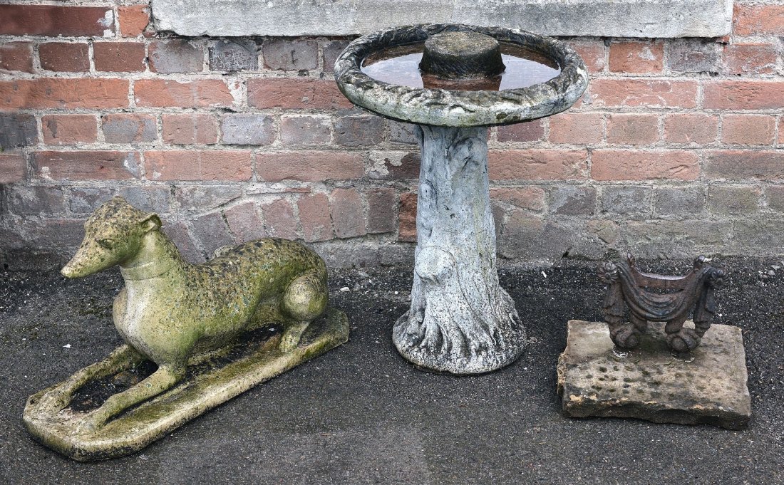 A stone composition model of a recumbent hound, 20th (1 of 1)