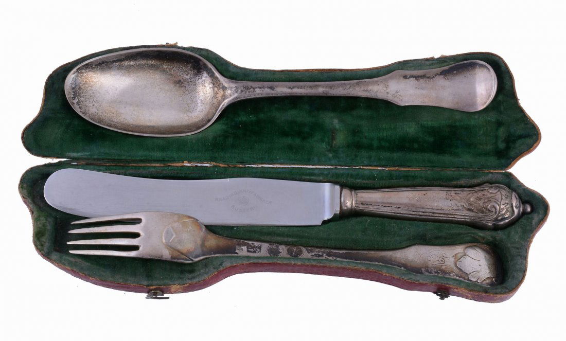 A mid 18th century Danish silver three piece: A mid 18th century Danish silver three piece cutlery/flatware place setting, maker's mark RPS, Copenhagen 1763, in a version of the violine pattern, engraved C.E.F.W., in a red leather covered case, t