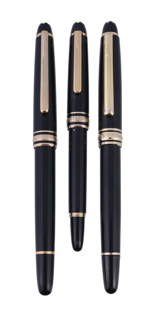 Montblanc, Meisterstuck, a black fountain pen: Montblanc, Meisterstuck, a black fountain pen, the black cap and barrel with gilt trim, the nib stamped 14K, inked; Montblanc, Meisterstuck, a black fountain pen, inked; Montblanc, Meisterstuck, a rol