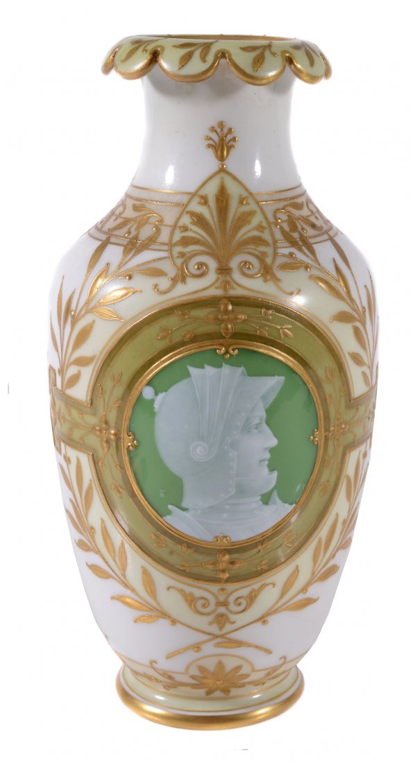 A Berlin porcelain pate-sur-pate shouldered vase by: A Berlin (KPM) porcelain pate-sur-pate shouldered vase by Hermann Thiele , circa 1890, decorated with a green-ground oval medallion of a knight wearing helmet with raised visor and reserved on a gilt
