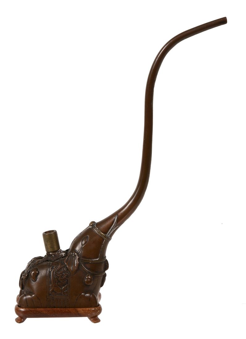 A Chinese bronze elephant silver-inlaid water pipe, (1 of 3)