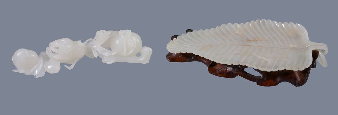 A Chinese pale celadon or white jade carving of fruit, (1 of 7)