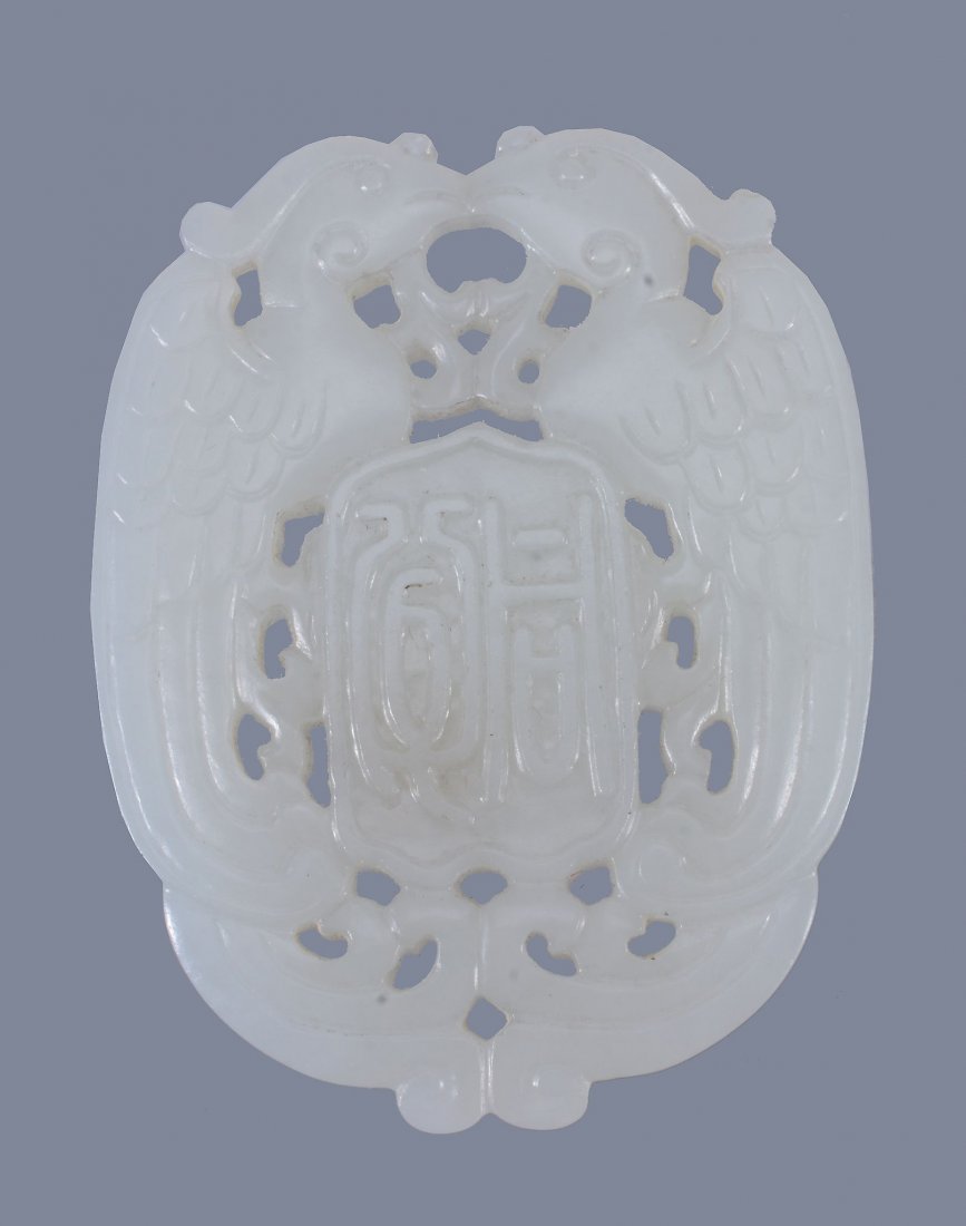 A Chinese white jade double 'Phoenix' pendant (1 of 2)