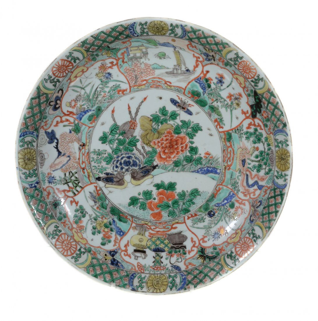 A Chinese Famille Verte Dish, Kangxi, painted with (1 of 8)