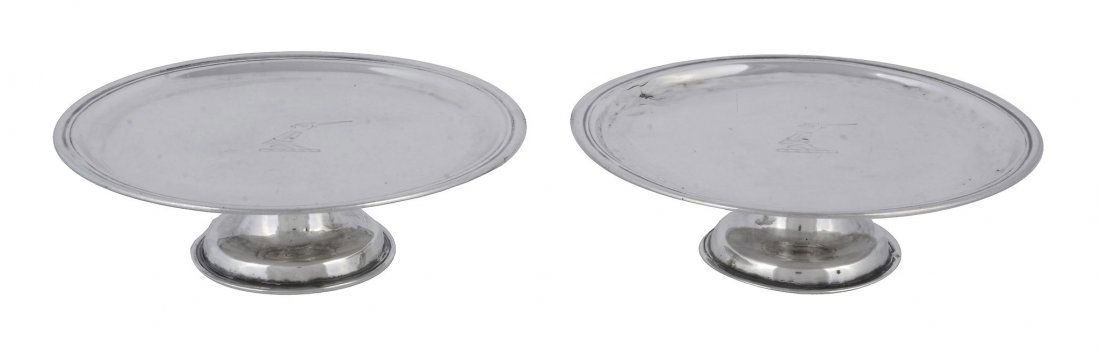 A pair of George II Irish silver footed waiters by John: A pair of George II Irish silver footed waiters by John Walker, Dublin 1739, with a slightly raised moulded rim, on a waisted foot, engraved with a crest, each engraved J. W. Bayly of Tolka to his son