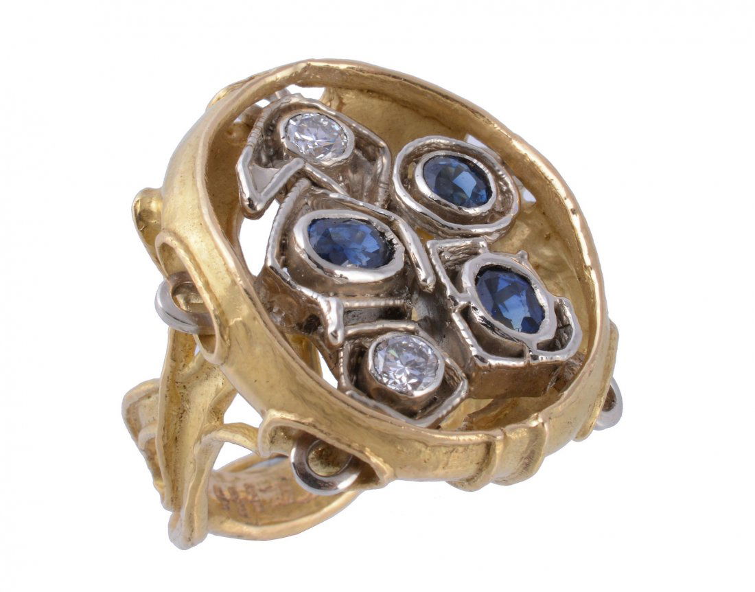 A sapphire and diamond dress ring by Claudio Tacchi (1 of 2)