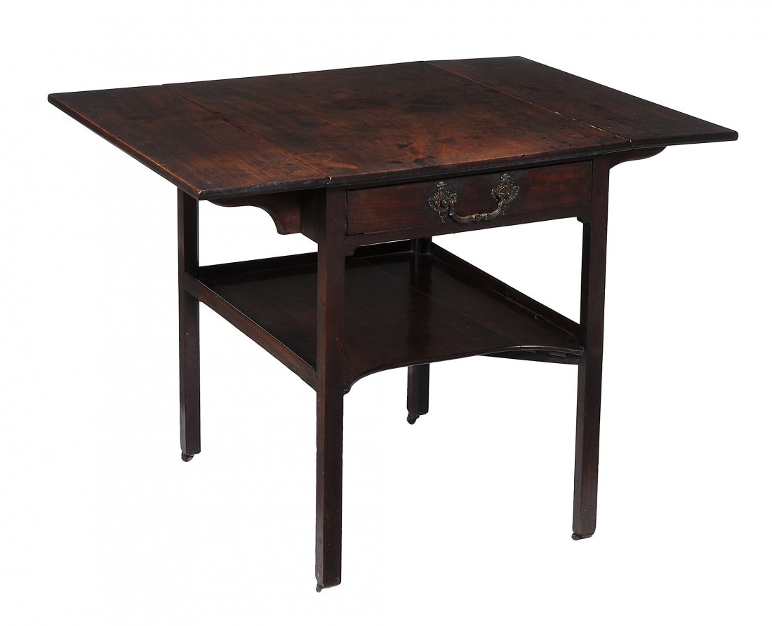 A George III mahogany Pembroke table , circa 1770: A George III mahogany Pembroke table , circa 1770, in the manner of Thomas Chippendale, the rectangular top incorporating a pair of hinged leaves, above a frieze drawer and square section legs centred