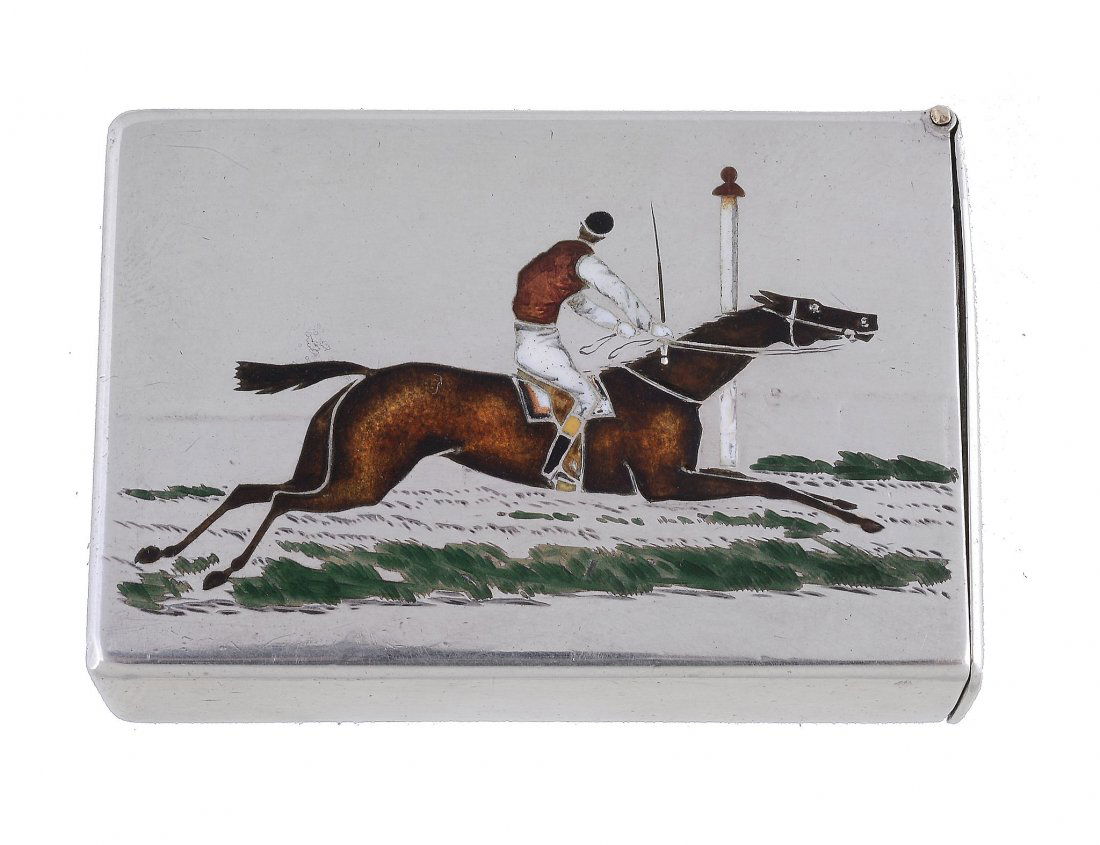 A Victorian silver and enamelled racing vesta case by: A Victorian silver and enamelled racing vesta case by Thomas Johnson II, London 1886 Rectangular form, the obverse decorated with an enamelled racing jockey and horse, with hinged lid and striker to u